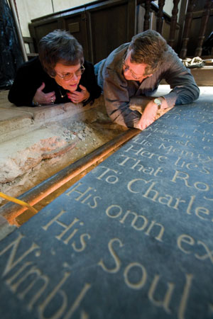 Jean Birdsong Tomes and Dr. Doug Owsley examining the tomb of Joseph Bridger Jean Birdsong Tomes and Dr. Doug Owsley examining the tomb of Joseph Bridger
